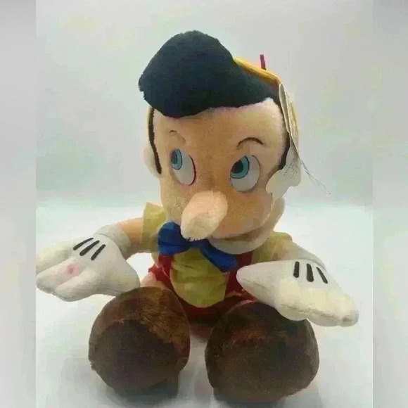 VINTAGE WALT DISNEY WORLD DISNEYLAND PINOCCHIO PLUSH STUFFED SITTING WITH TAG - Picture 1 of 9
